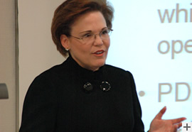 Proud Aggie parent Hallie Vanderhider, seen here speaking to students last year, has endowed a faculty chair in business at Mays Business School.