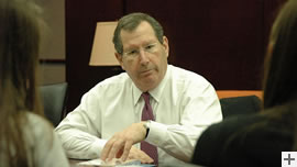 First Southwest Company chairman and CEO Hill Feinberg chats with undergraduate Business Honors students during a recent visit to campus. 