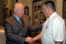 Van Alstyne greets a participant