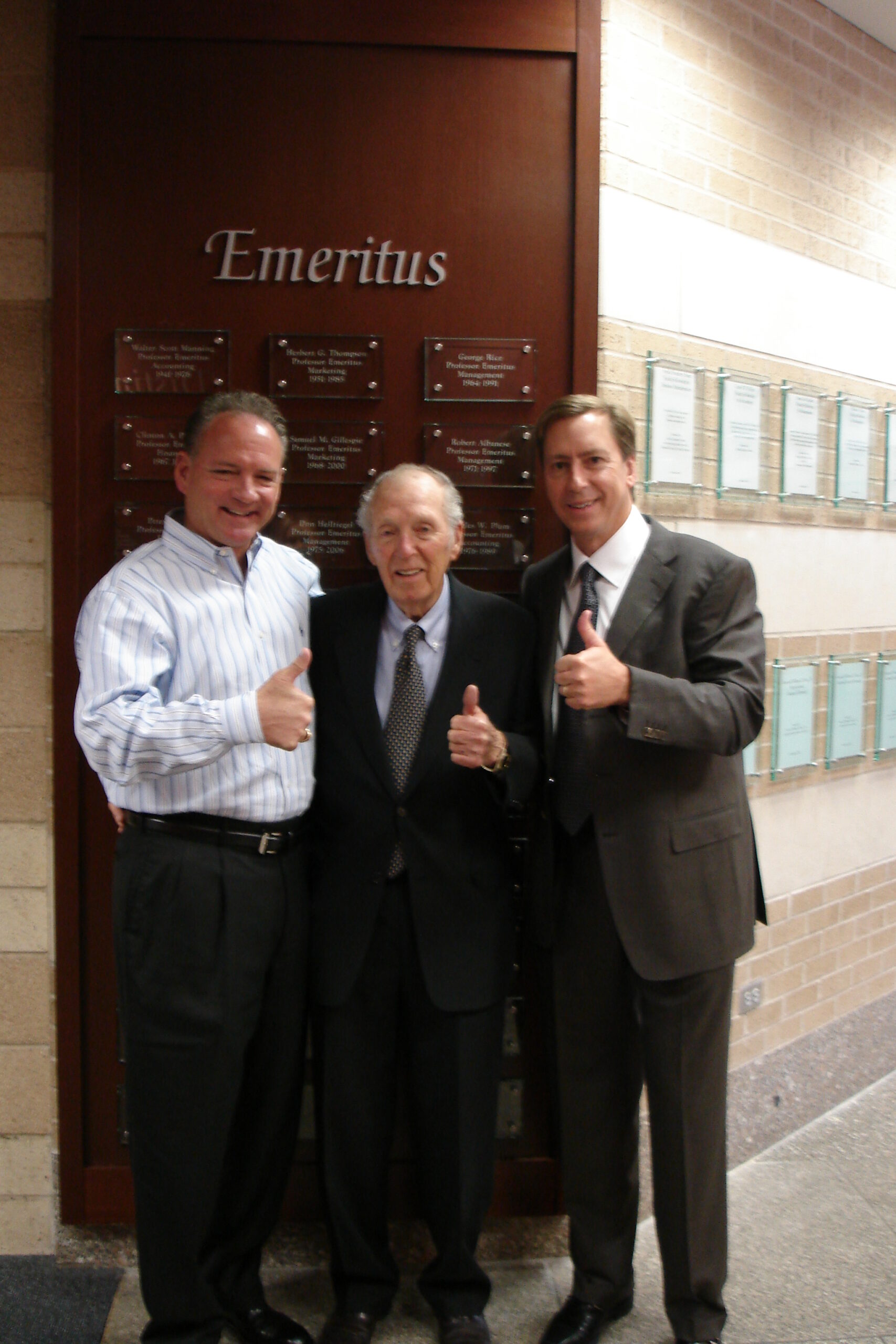 Herbert G. Thompson Jr. (center) died at age 94.