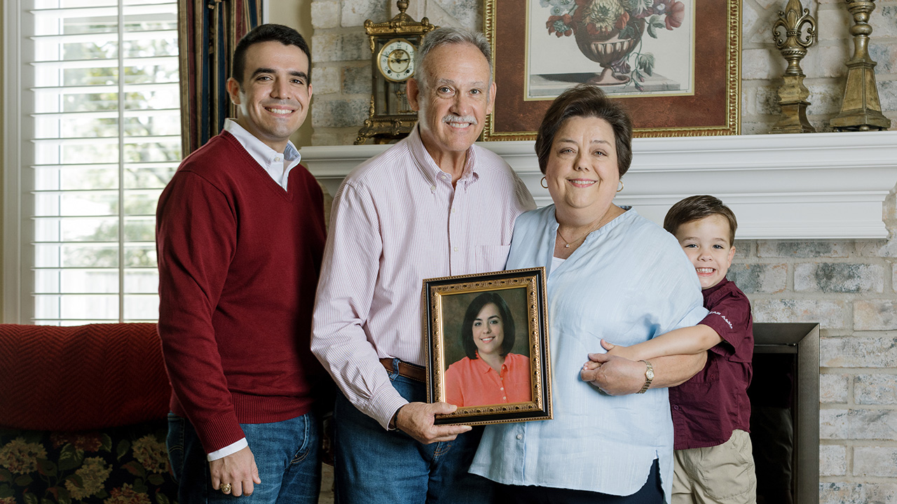 The Fowler Family with the photo of Victoria Fowler