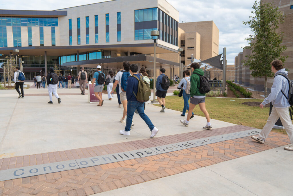 Students walking through the plaza