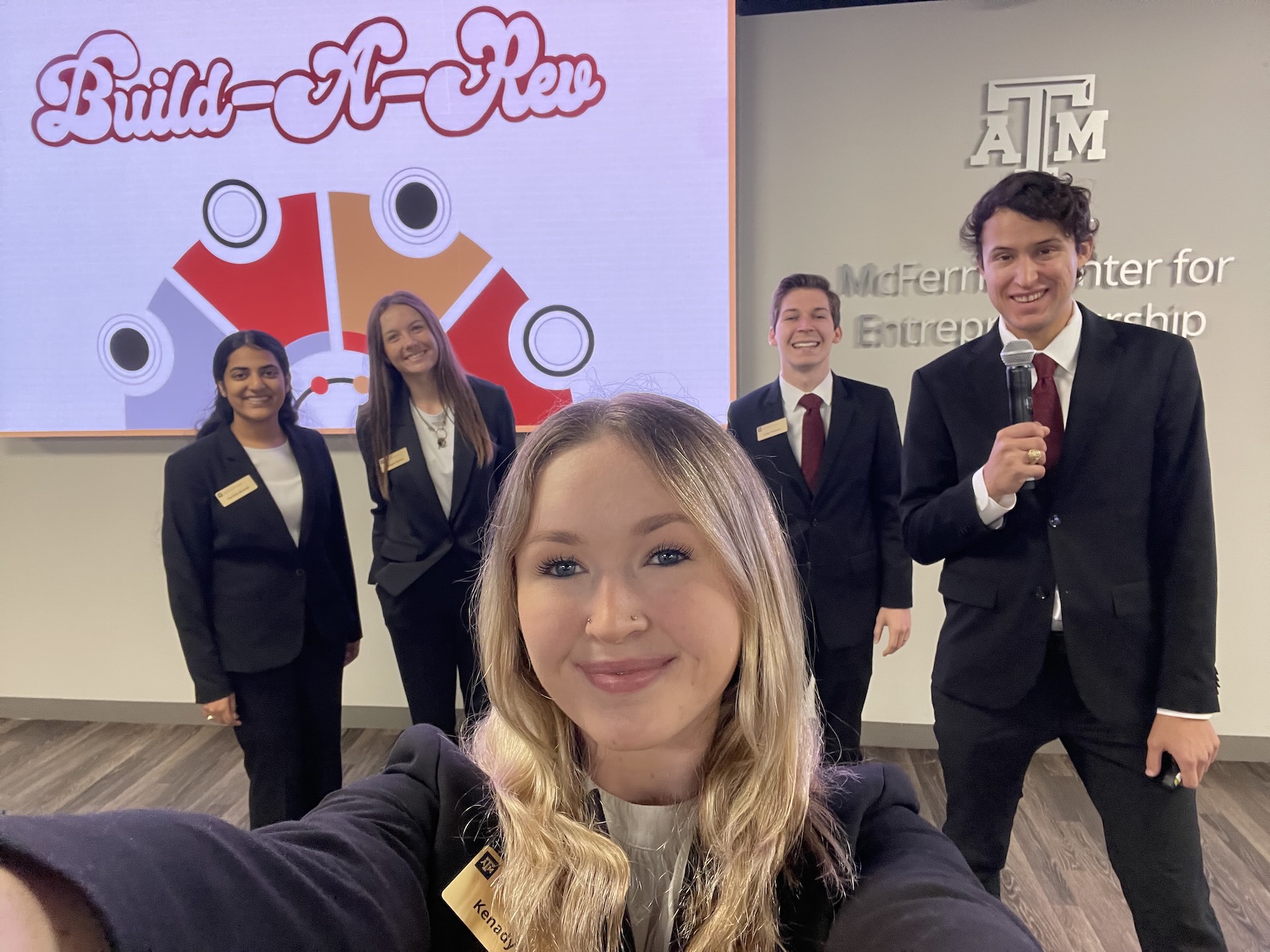 Build-a-Rev team selfie in business attire