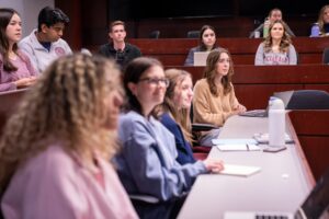 Mazie Johnson in a class with other students