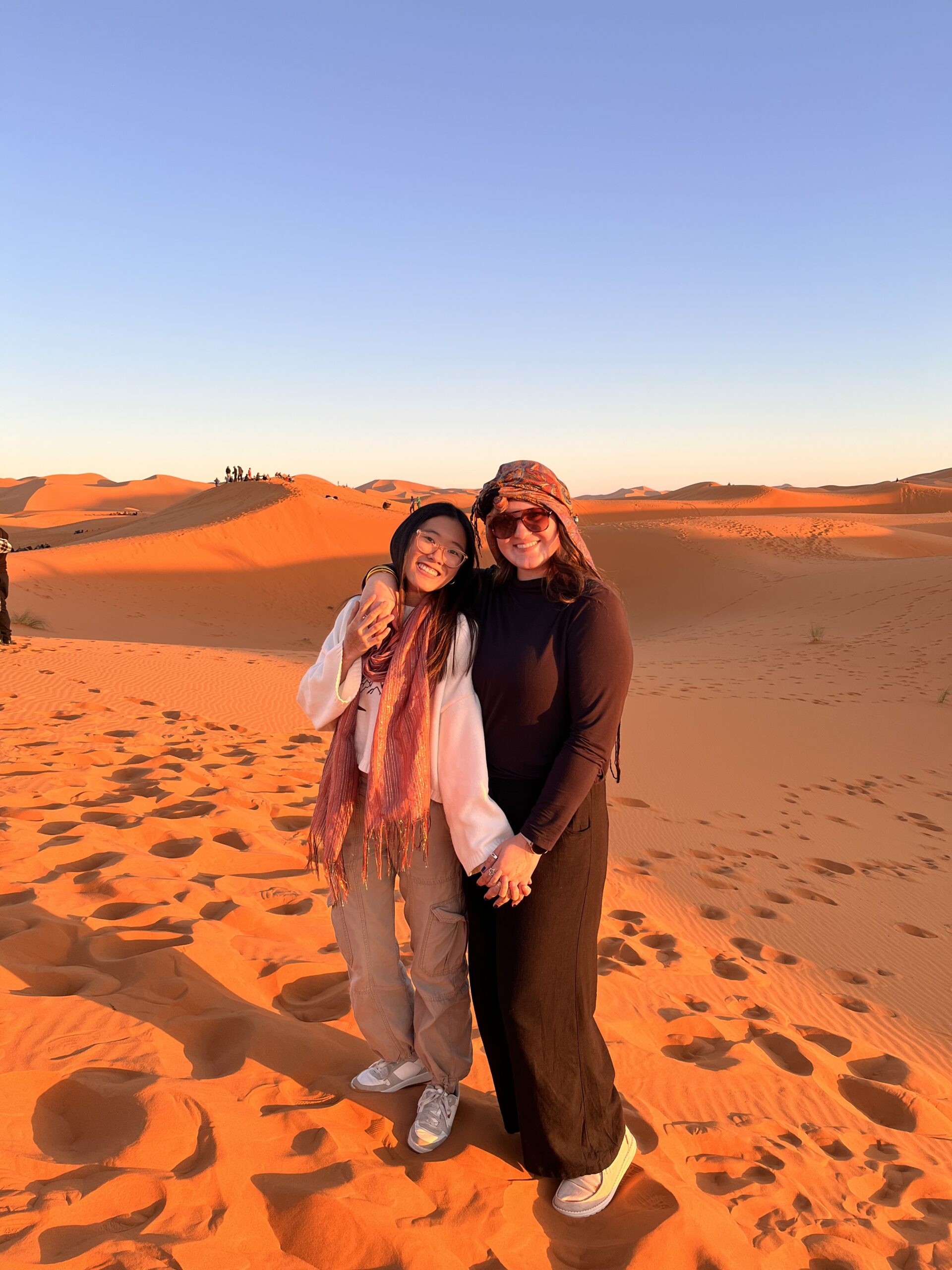 Two students in a desert